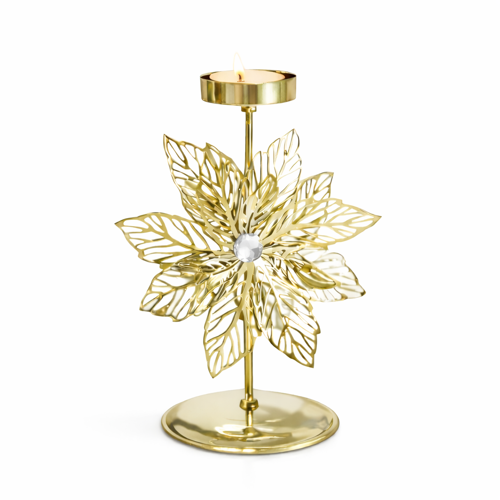 guldfärgad blomformad ljusstake i metall