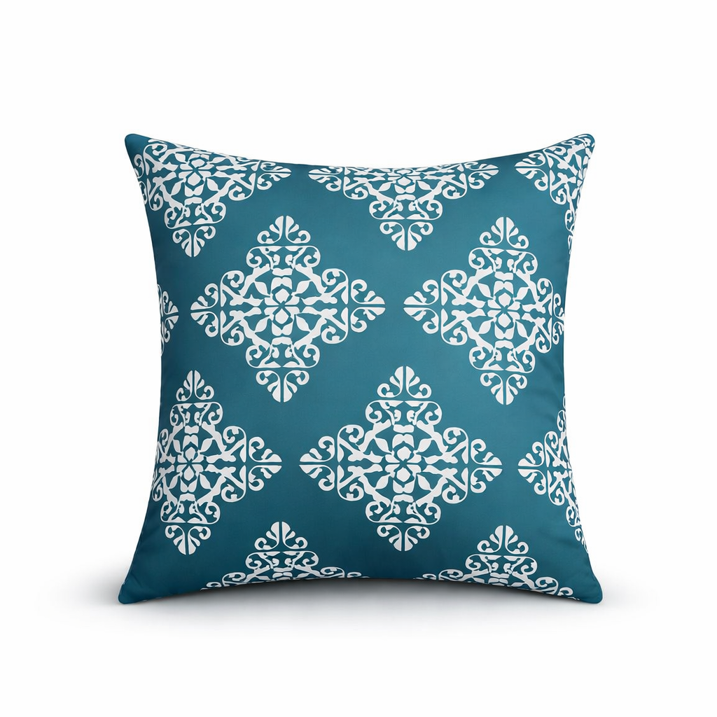 turkost kuddfodral damaskmönster vit bakgrund