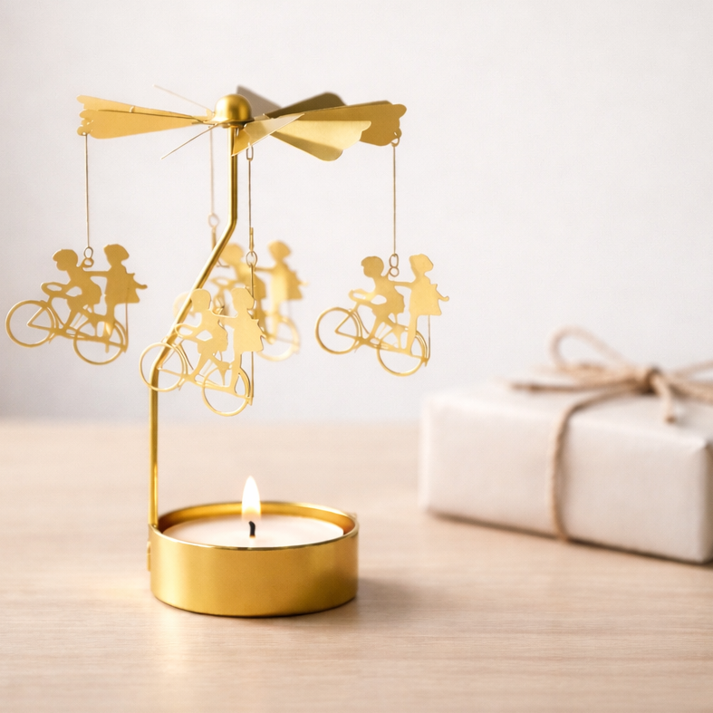 guld änglaspel cykelmotiv present bord